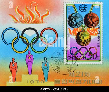 Souvenirbogen mit stornierter Briefmarke, gedruckt von Nordkorea, mit Medaillen, Olympischen Sommerspielen 1976 - Montreal, um 1976. Stockfoto
