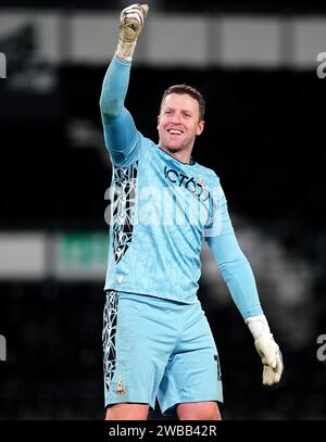 Bradford City Torhüter Colin Doyle feiert das Achtelfinale der Bristol City Motors Trophy in Pride Park, Derby. Bilddatum: Dienstag, 9. Januar 2024. Stockfoto