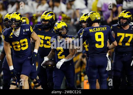 HOUSTON, Texas – 08. JANUAR: Michigan Wolverines Running Back Blake Corum (2) feiert nach einem Touchdown während der CFP National Championship gegen die Washington Huskies am 08. Januar 2024 im NRG Stadium in Houston, Texas. (Foto: Joe Robbins/Image of Sport) Stockfoto