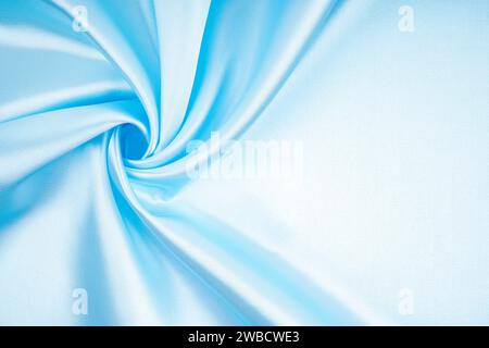 Abstrakter Hintergrund luxuriöses blaues Tuch oder flüssige Wellen oder wellige Falten von Grunge Seide Textur Satin Samt Stockfoto