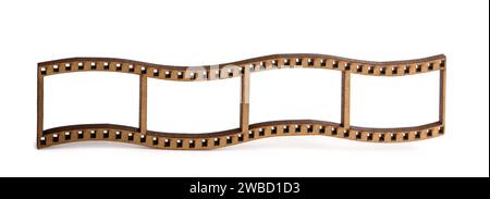Alter 35-mm-Filmstreifen in Holz isoliert auf weißem Hintergrund Stockfoto
