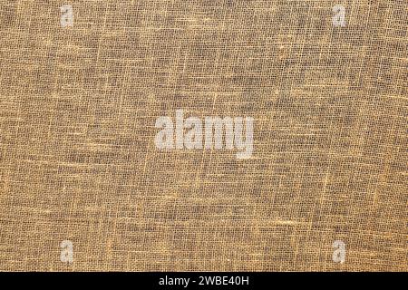 Jute Stoff Sacktuch Sackleinen Textur Hintergrund beige Creme braune Farbe. Stockfoto