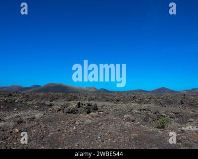 Spektakuläre Ausblicke auf die Feuerberge im Timanfaya Nationalpark, dieser einzigartigen Gegend, die vollständig aus vulkanischen Böden besteht. Lanzarote Stockfoto