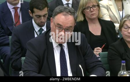 Screenshot vom Parlamentsfernsehen des Gouverneurs der Bank of England Andrew Bailey, der vor dem Ausschuss für Treasury Select im Houses of Parliament in London über die Bedrohung der Finanzstabilität durch Zinsanstiege spricht. Bilddatum: Mittwoch, 10. Januar 2024. Stockfoto