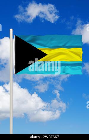 Nationalflagge der Bahamas vor Cumulus Wolken und blauem Himmel, Studio Stockfoto