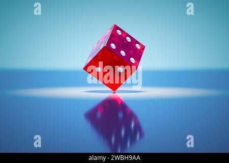 Ein durchscheinender Kunststoff-Würfel steht an seiner Kante. Stockfoto