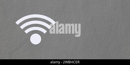 WLAN-Symbol auf dem Hintergrund der alten Zementwand Stockfoto