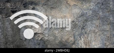 Weißes wlan-Symbol auf Steinhintergrund. Stockfoto