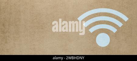 Blaues WLAN-Symbol auf braunem Papierhintergrund. Stockfoto