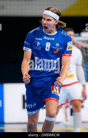 München, Deutschland. Januar 2024. Handball: Europameisterschaft, Island - Serbien, Vorrunde, Gruppe C, Spieltag 1. Islands Bjarki Mar Elisson jubelt während des Spiels. Quelle: Marco Wolf/dpa/Alamy Live News Stockfoto