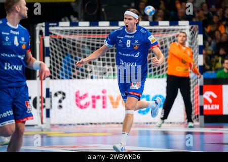 München, Deutschland. Januar 2024. Handball: Europameisterschaft, Island - Serbien, Vorrunde, Gruppe C, Spieltag 1. Islands Bjarki Mar Elisson jubelt während des Spiels. Quelle: Marco Wolf/dpa/Alamy Live News Stockfoto