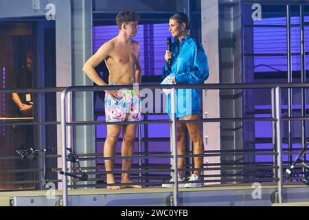 Valentin Lusin und Laura Wontorra - Livesendung des RTL Turmspringen 2024 im Berliner Velodrom am 12.01.2024. RTL Turmspringen - Livesendung *** Valentin Lusin und Laura Wontorra Live-Übertragung der RTL Turmspringen 2024 im Berliner Velodrom am 12 01 2024 RTL Turmspringen Live-Übertragung Stockfoto