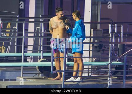 Marco Cerullos und Laura Wontorra - Livesendung des RTL Turmspringen 2024 im Berliner Velodrom am 12.01.2024. RTL Turmspringen - Livesendung *** Marco Cerullos und Laura Wontorra Live-Übertragung der RTL Turmspringen 2024 im Berliner Velodrom am 12 01 2024 RTL Turmspringen Live-Übertragung Stockfoto