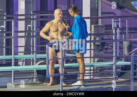 Fabian Hambuechen und Laura Wontorra - Livesendung des RTL Turmspringen 2024 im Berliner Velodrom am 12.01.2024. RTL Turmspringen - Livesendung *** Fabian Hambuechen und Laura Wontorra Live-Übertragung der RTL Turmspringen 2024 im Berliner Velodrom am 12 01 2024 RTL Turmspringen Live-Übertragung Stockfoto