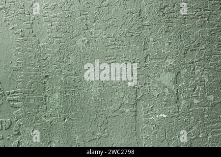 Textur von grüner Rissfarbe Textur von einer alten, abblätternden, zeitbeschädigten Holzoberfläche. Stockfoto