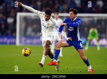 Georginio Rutter von Leeds United und Ryan Wintle von Cardiff City (rechts) kämpfen um den Ball während des Sky Bet Championship-Spiels im Cardiff City Stadium, Wales. Bilddatum: Samstag, 13. Januar 2024. Stockfoto