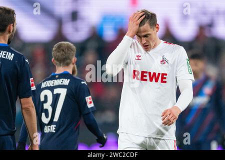 Köln, Deutschland. Januar 2024. Fußball, Bundesliga, Spieltag 17, 1. FC Köln - 1. FC Heidenheim, RheinEnergieStadion: Kölner Steffen Tigges reagiert während des Spiels. Hinweis: Marius Becker/dpa – WICHTIGER HINWEIS: gemäß den Vorschriften der DFL Deutscher Fußball-Liga und des DFB Deutscher Fußball-Bundes ist es verboten, im Stadion und/oder des Spiels aufgenommene Fotografien in Form von sequenziellen Bildern und/oder videoähnlichen Fotoserien zu verwenden oder zu nutzen./dpa/Alamy Live News Stockfoto