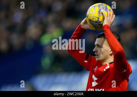 Birkenhead, Großbritannien. Januar 2024. Joe Tomlinson von Milton Keynes Dons macht einen Sprung. EFL Skybet Football League Two Match, Tranmere Rovers gegen MK Dons im Prenton Park, Birkenhead, Wirral am Samstag, den 13. Januar 2024. Dieses Bild darf nur für redaktionelle Zwecke verwendet werden. Nur redaktionelle Verwendung, .PIC von Chris Stading/ Credit: Andrew Orchard Sportfotografie/Alamy Live News Stockfoto