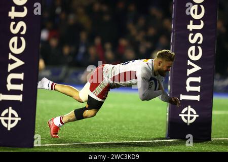 Cardiff, Großbritannien. Januar 2024. Tyrone Green von Harlequins erzielt seinen Teams den letzten Versuch des Spiels. Investec Champions Cup Rugby, Pool 2 Spiel, Cardiff Rugby gegen Harlequins im Cardiff Arms Park in Cardiff, Wales am Samstag, den 13. Januar 2024. bild von Andrew Orchard/Andrew Orchard Sportfotografie/Alamy Live News Credit: Andrew Orchard Sportfotografie/Alamy Live News Stockfoto