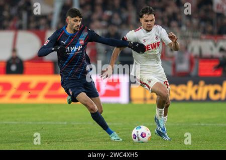 ZWEIKAMPF zwischen Eren Dinkci (FC Heidenheim, #08) und Max Finkgraefe (1. FC Köln, #35). Fußball: 1. Bundesliga, Saison 2023/2024, 17. Spieltag, 1. FC Köln - 1. FC Heidenheim 1846 am 13.01.2024 im RheinEnergieStadion in Köln Wichtiger Hinweis: Gemaess den Vorgaben der DFL Deutsche Fussball Liga bzw. Des DFB Deutscher Fussball-Bund ist es untersagt, in dem Stadion und/oder vom Spiel angefertigte Fotoaufnahmen in Form von Sequenzbildern und/oder videoaehnlichen Fotostrecken zu verwerten bzw. Verwerten zu lassen. Foto: Kirchner-Media/TH Stockfoto