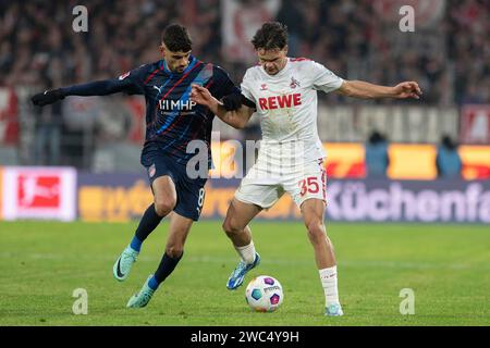 ZWEIKAMPF zwischen Eren Dinkci (FC Heidenheim, #08) und Max Finkgraefe (1. FC Köln, #35). Fußball: 1. Bundesliga, Saison 2023/2024, 17. Spieltag, 1. FC Köln - 1. FC Heidenheim 1846 am 13.01.2024 im RheinEnergieStadion in Köln Wichtiger Hinweis: Gemaess den Vorgaben der DFL Deutsche Fussball Liga bzw. Des DFB Deutscher Fussball-Bund ist es untersagt, in dem Stadion und/oder vom Spiel angefertigte Fotoaufnahmen in Form von Sequenzbildern und/oder videoaehnlichen Fotostrecken zu verwerten bzw. Verwerten zu lassen. Foto: Kirchner-Media/TH Stockfoto