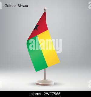 Die Flagge von Guinea-Bissau hängt an einem Flaggenständer. Verwendbar für Gipfelpräsentationen oder Konferenzen Stock Vektor