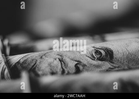 100 Dollar als Hintergrund für Makrofotos, 100 Dollar für Wirtschaft und Finanzen Stockfoto