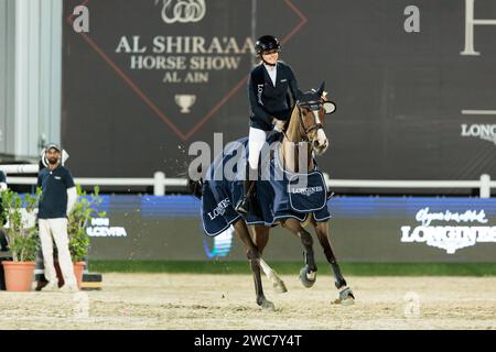 Gold and Shooting Club, VAE. 14. Januar 2024. Sophie Hinners of Germany mit Singclair während des CSI4*-W - Longines Al Shira’aa FEI Jumping World Cup™ Gand Prix bei der Al Shira'aa Horse Show am 14. Januar 2024, Al Ain Equestrial, Gold and Shooting Club, Vereinigte Arabische Emirate (Foto von Maxime David - MXIMD Pictures) Credit: MXIMD Pictures/Alamy Live News Stockfoto