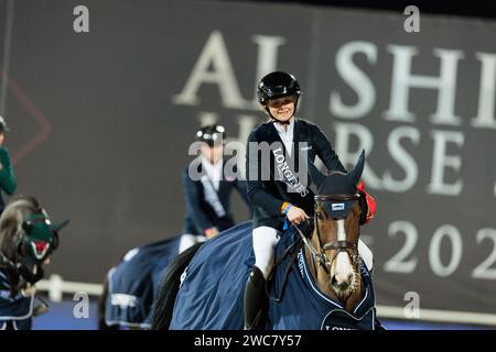 Gold and Shooting Club, VAE. 14. Januar 2024. Sophie Hinners of Germany mit Singclair während des CSI4*-W - Longines Al Shira’aa FEI Jumping World Cup™ Gand Prix bei der Al Shira'aa Horse Show am 14. Januar 2024, Al Ain Equestrial, Gold and Shooting Club, Vereinigte Arabische Emirate (Foto von Maxime David - MXIMD Pictures) Credit: MXIMD Pictures/Alamy Live News Stockfoto