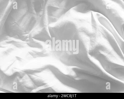 Die Linie und das Muster dieses seidenweißen Stoffes sorgen für eine optisch ansprechende Textur, die die Ästhetik insgesamt verbessert und ein Gefühl von sophist vermittelt Stockfoto