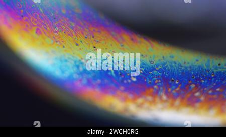 Neonfarbe holographische Kugel Regenbogenfarben-Mix-Flow Stockfoto