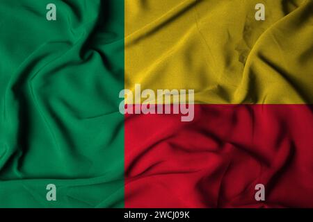 Selektive Focus benin-Flagge mit gewellter Stoffstruktur. 3D-Abbildung Stockfoto