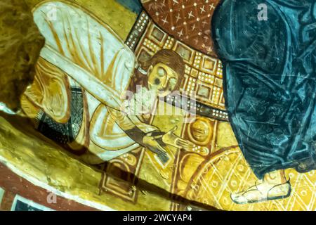 Ein Detail der Fresken der Karanlik Dark Church, Goreme Museum der Höhlenkirchen, Kappadokien Türkei 11. Jahrhundert. Mittelalterlicher Mann, der auf den Knien verehrt Stockfoto