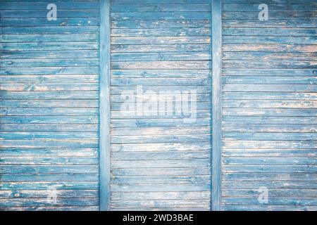 Verwitterter verblasster blau gemalter Holzbretter Wandnaht als Grunge Hintergrund Stockfoto