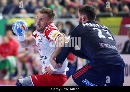 Köln, Deutschland. Januar 2024. 18.01.2024., Njemacka, Köln - EHF Europsko prvenstvo u rukometu 2024. u Njemackoj. Drugi krug, Francuska - Hrvatska. Luka Cindric, Ludovic Fabregas. Quelle: Pixsell/Alamy Live News Stockfoto