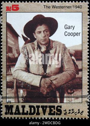 Bild von Gary Cooper im Westerner auf Briefmarke Stockfoto
