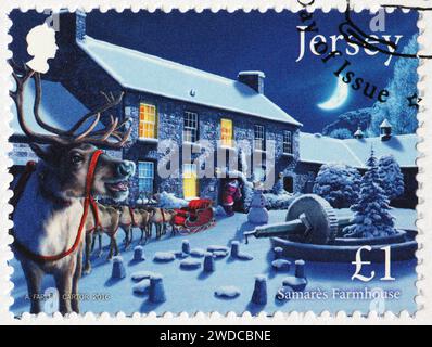 Santa Claus in einer Farmaus von Jersey auf Briefmarke Stockfoto