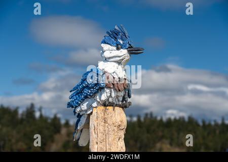 Holzskulpturen entlang der Esquimalt Lagoon, Victoria, Vancouver Island, British Columbia, Kanada. Stockfoto