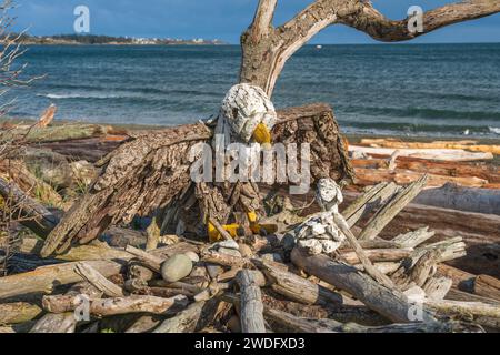 Holzskulpturen entlang der Esquimalt Lagoon, Victoria, Vancouver Island, British Columbia, Kanada. Stockfoto