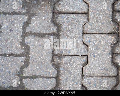 Hintergrund aus alten Kacheln. Pflaster aus Betonplatten. Muster Stockfoto