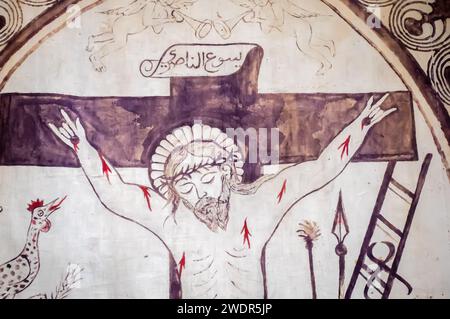 Die Kreuzigung Christi, 1907, Holzschnitt mit Handmalerei auf Baumwollstoff, Mardin 40 Märtyrerkirche, Türkei. Fragment Stockfoto