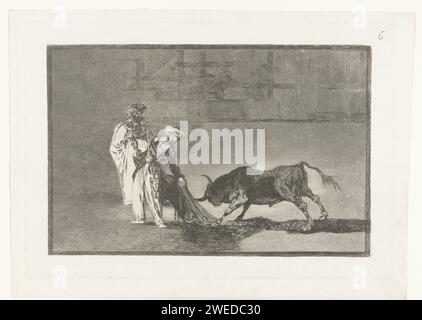 Stierkämpfer in einer Arena, Francisco de Goya, 1811–1816 drucken zwei Toreros (Stierkämpfer) in maurischer Kleidung, kämpfen mit einem Stier in einer Arena. Einer der Männer fordert den Stier mit einem Mantel heraus. Spanien Papier-Ätzen / Trockenpunkt-Stierkampf. Stierkämpfer, Toreador. Bull. Kopfschutz: Turban Stockfoto