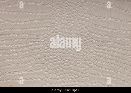 Hintergrundbild – beige Krokodilhaut. Stockfoto