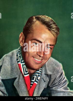 Alan Ladd spielt die Hauptrolle in The Great Gatsby (1949), einer Verfilmung von F. Scott Fitzgeralds klassischem Roman. In dieser Version stellt Ladd den rätselhaften und wohlhabenden Jay Gatsby dar, einen Mann, der von der Vergangenheit und seiner verlorenen Liebe besessen ist, Daisy Buchanan. Stockfoto