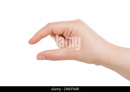 Frau Hand hält einige wie ein leeres Objekt auf einem weißen Hintergrund isoliert Stockfoto