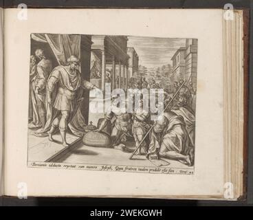 Jozefs Brüder mit Benjamin für Jozef, 1579 Druck Jozefs Brüder und ihr kleiner Bruder Benjamin kehrten nach Ägypten zurück und knien für Joseph. Er lädt sie zu einem Essen ein. Hinten links sitzen die Brüder zu Joseph zum Essen. Ganz im Hintergrund ist die Fortsetzung der Geschichte zu sehen: Der silberne Becher Josephs befindet sich in Benjamins Tasche. Unter der Aufführung ist ein lateinischer Verweis auf den Bibeltext in Gen. 43. Drucken ist Teil eines Albums. Papierstich Joseph empfängt seine Brüder und Benjamin. Das fest in Josephs Haus: Das Erstaunen seiner Brüder über den Sitzplatz Stockfoto