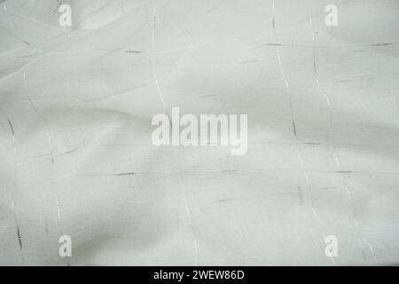 Abstrakter welliger Hintergrund mit weißer Stoffstruktur Stockfoto