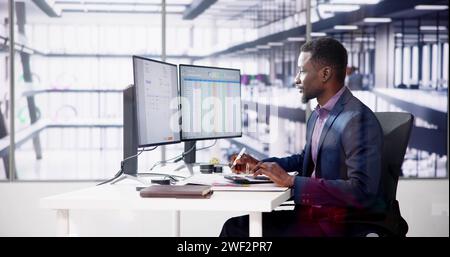Datenanalyst Afrikanischer Mann Mit Tabellenkalkulation Auf Computer Stockfoto