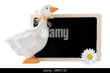 Hölzerne Gans mit Etikett und Blume isoliert auf weißem Hintergrund Stockfoto