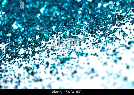 Ein funkelnder Glitzer auf weißem Hintergrund Bokeh Abstract Close Up Blue Stockfoto